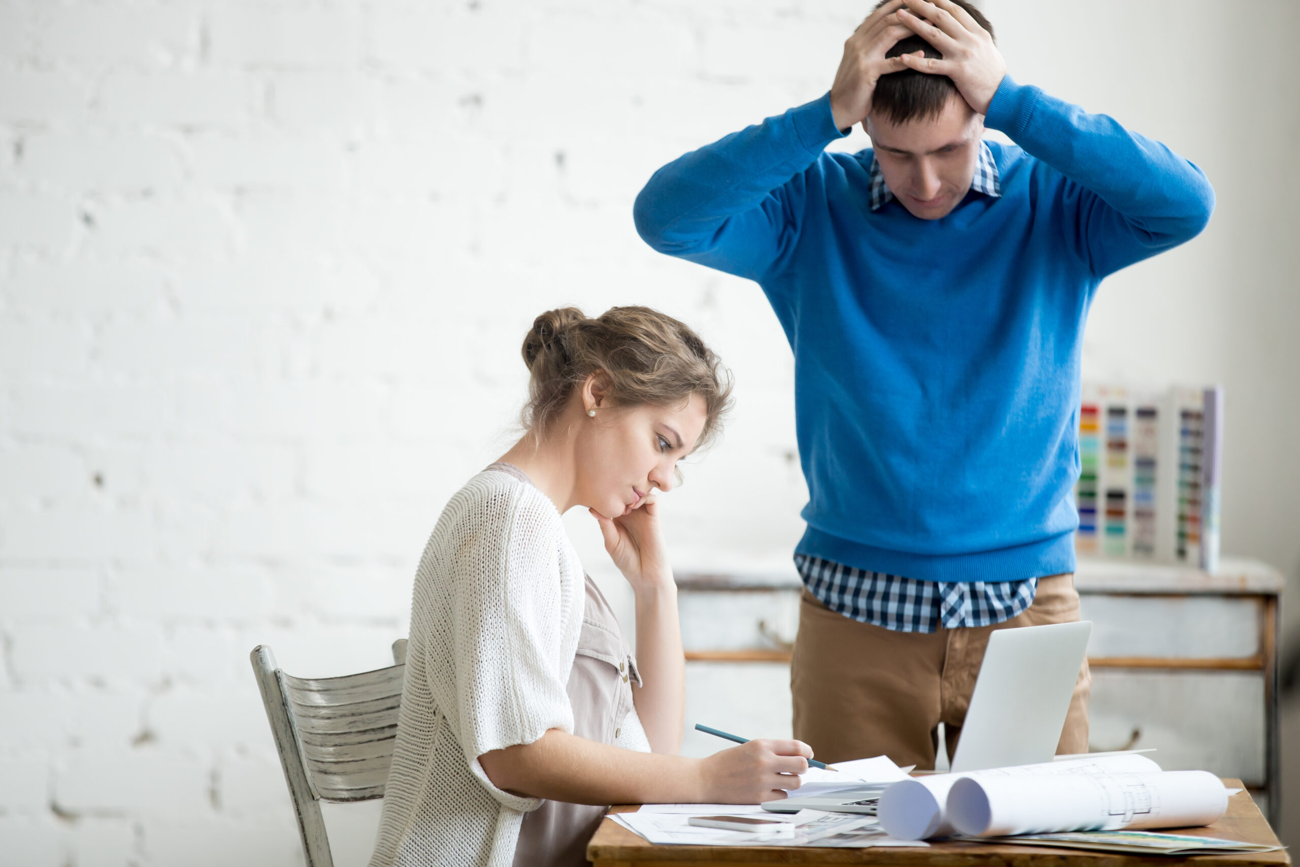 Two Colleagues Feeling Troubled At Work